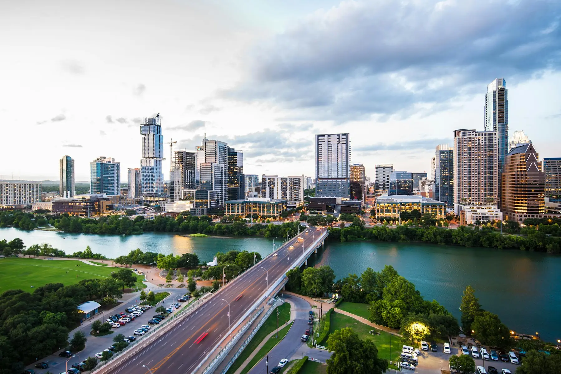 Austin’s skyline and Congress Avenue Bridge overlooking Lady Bird Lake at dusk